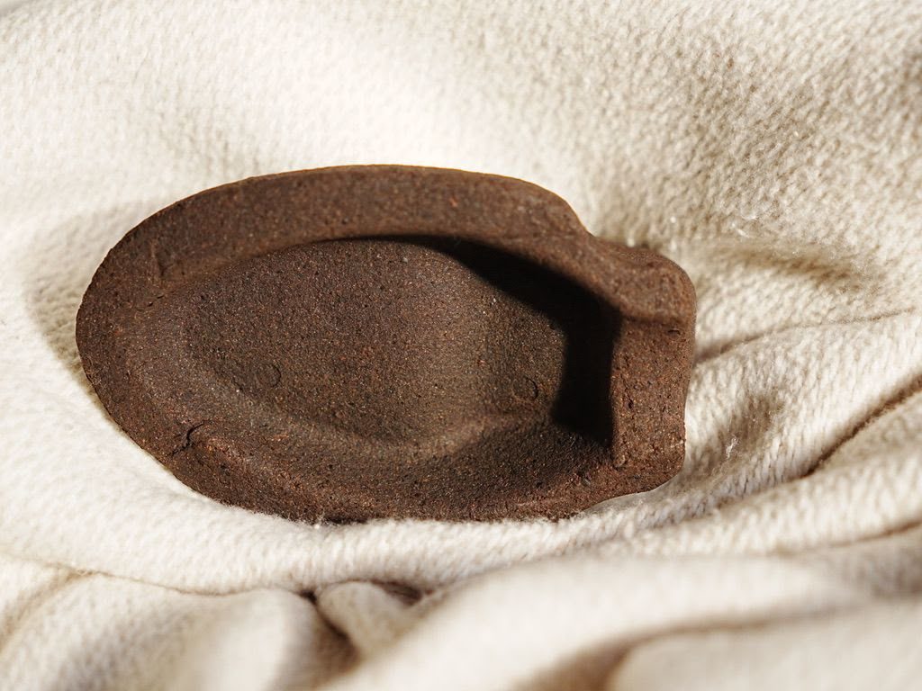 A finished Kahyve shoe tree showing its moulded hollow form