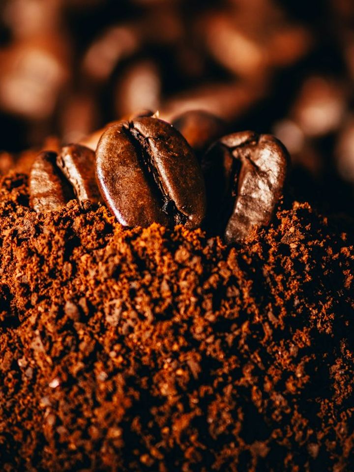 Freshly ground coffee piled up